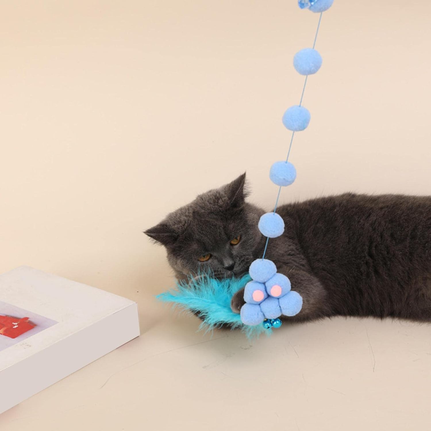 Feather toy for cats with bells